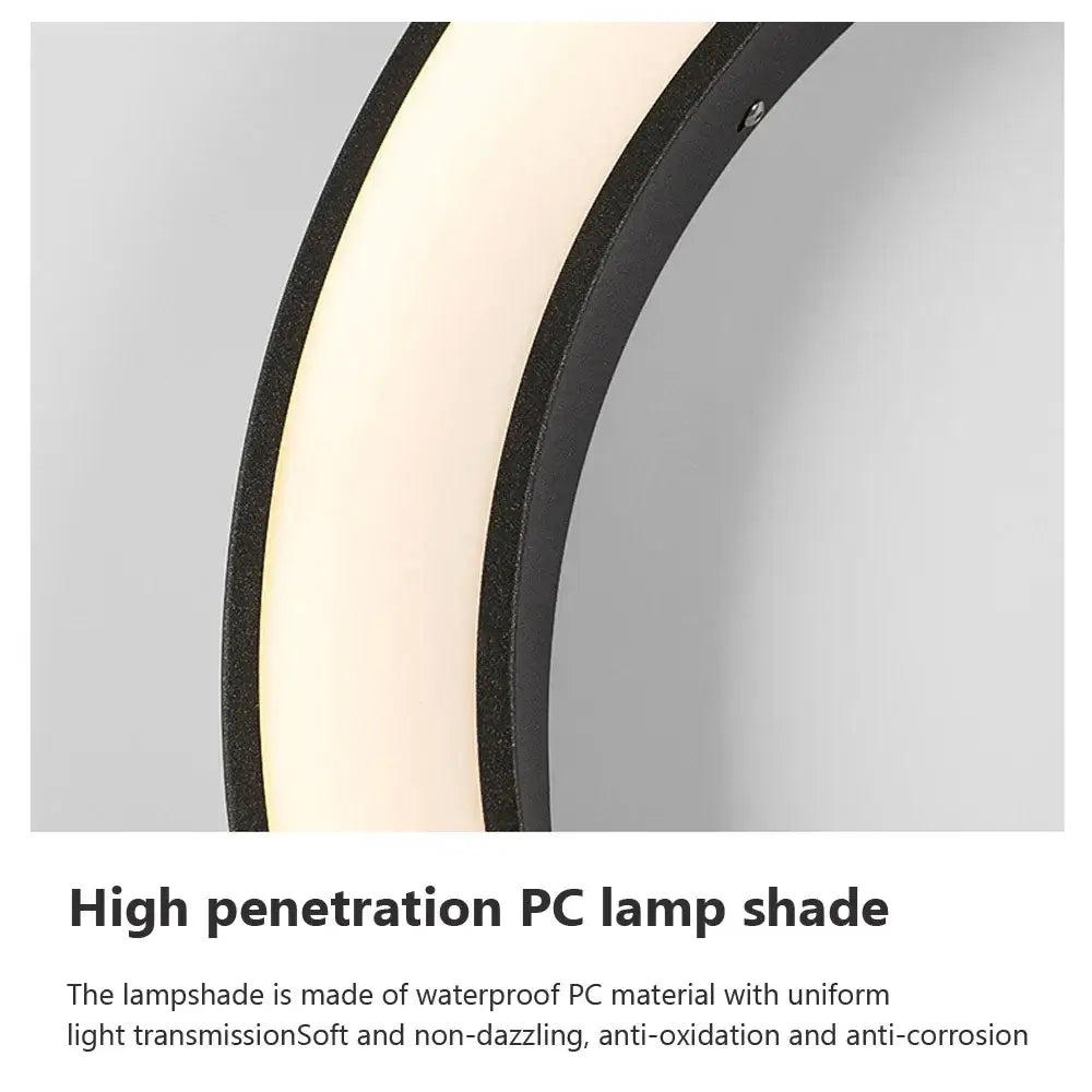 Modern black-framed circular led wall lamp with soft white light for elegant curved outdoor space decorbites lighting