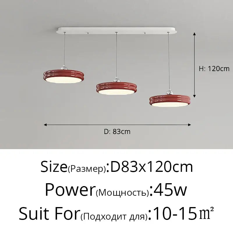 Red circular pendant lights with glossy finish hang from white ceiling mount in decorbites circular modern chandelier