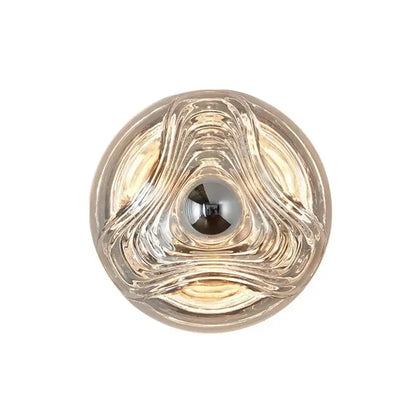 Modern circular swirling designer glass wall lamp with a central reflective element for bedroom decorbites wall lamp decor