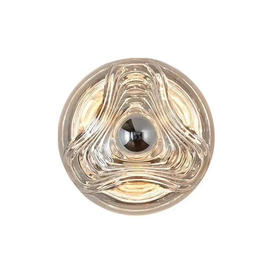 Modern circular swirling designer glass wall lamp with a central reflective element for bedroom decorbites wall lamp decor