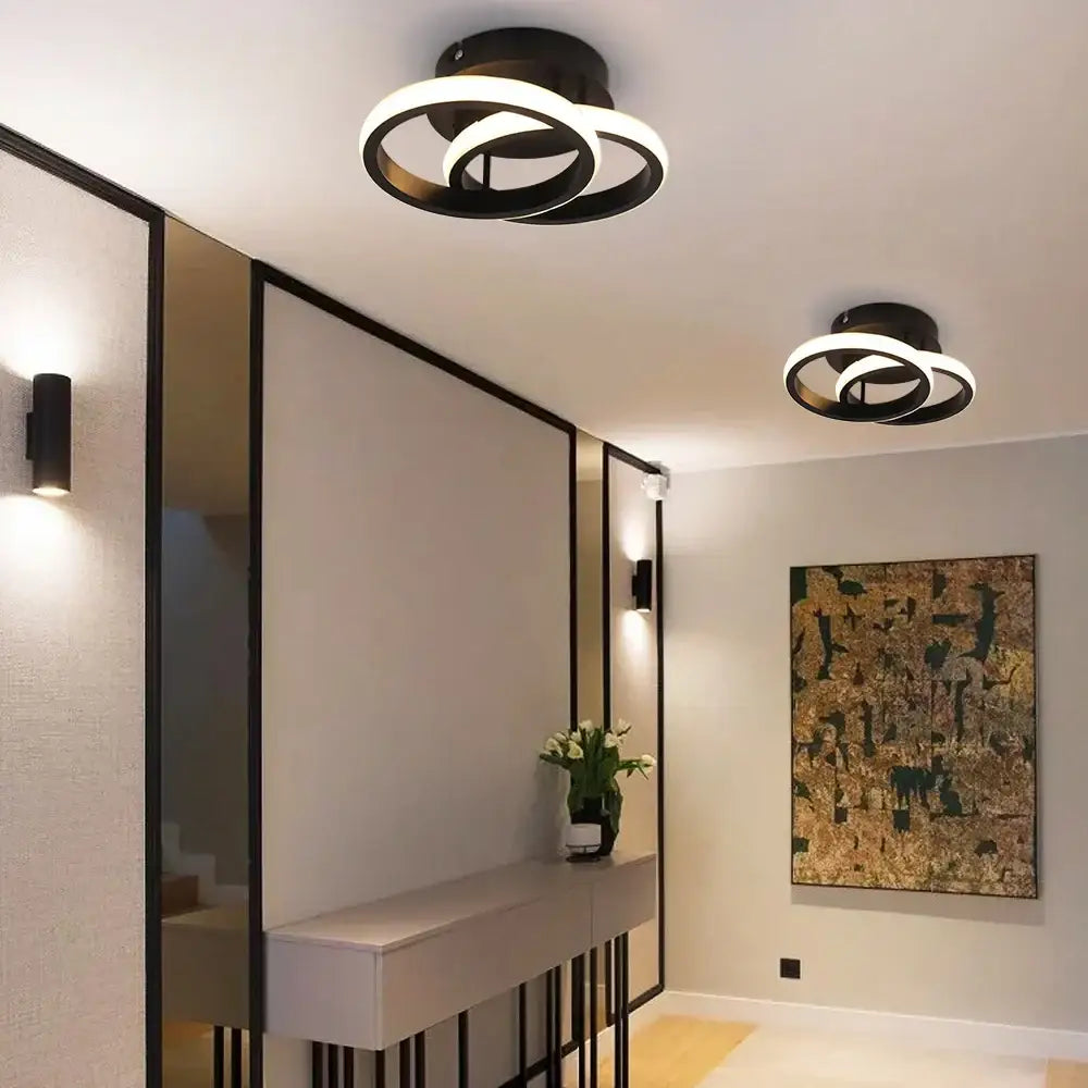 Modern circular black and white decorbites acrylic led ceiling light with sleek minimalist design for bedroom decor