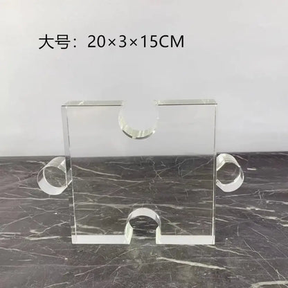 Modern clear acrylic geometric puzzle bookends with rectangular base and circular handles for decorbites crystal geometric display