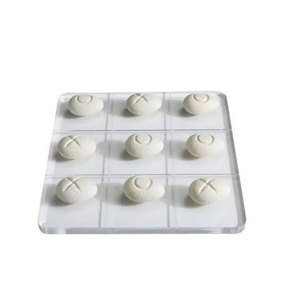 Modern clear acrylic tic tac toe board with white resin pebble chess pieces for living room decor