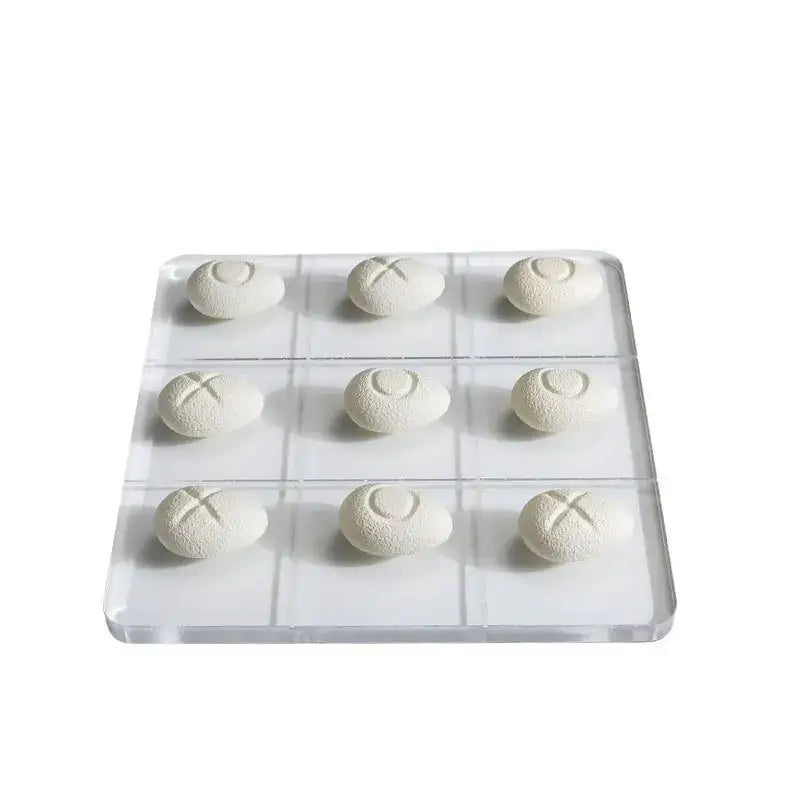 Modern clear acrylic tic tac toe board with white resin pebble chess pieces for living room decor