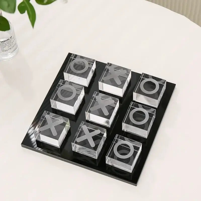 Modern clear acrylic tic tac toe set with engraved xs and os on black base decorbites geometric crystal chess decor