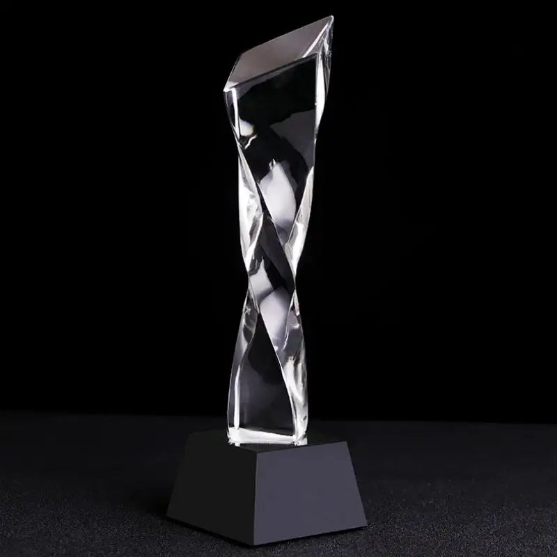 Modern clear and blue glass twisted column trophy with clear crystal design and black base for office awards decorbites blue glass