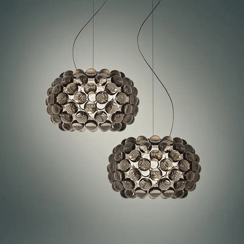 Modern clear bubble caboche led chandelier featuring spherical glass pendant lights with textured dark gray finish