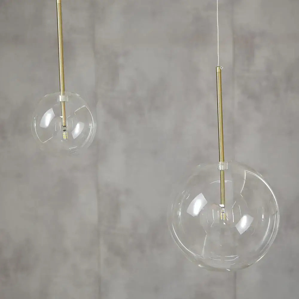 Modern clear bubble glass ball pendant light with clear glass globes and brass-finished rods for kitchen decorbites bubble glass