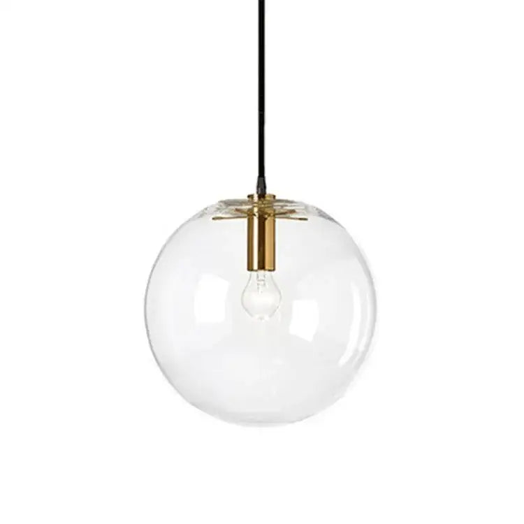 Modern clear bubble glass ball pendant light with brass-finished metal fixture and black cord for kitchen decorbites bubble glass
