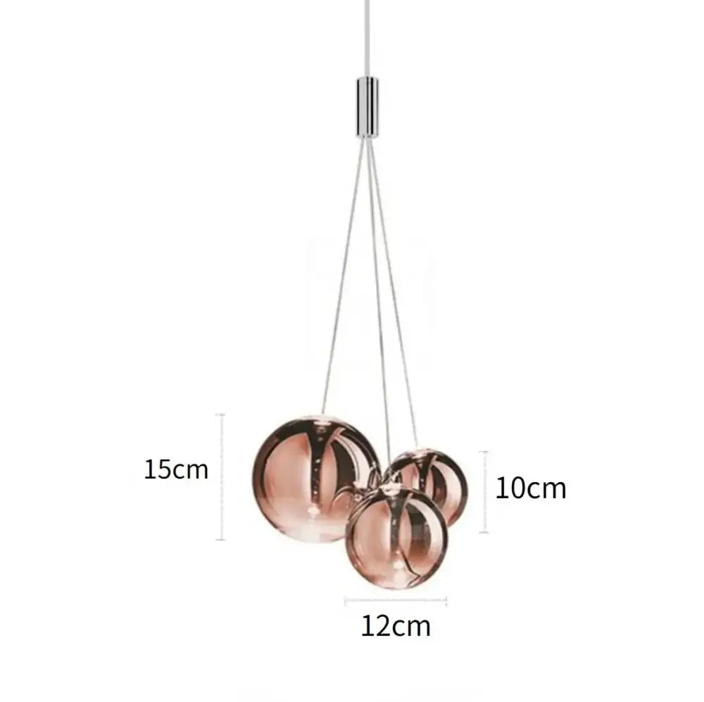 Modern clear bubble glass pendant light with copper tone and chrome hardware ideal for dining room decorbites bubble glass