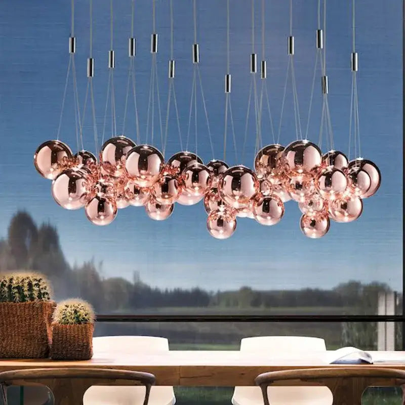 Modern rose gold decorbites bubble glass pendant light with reflective spheres for dining room decor