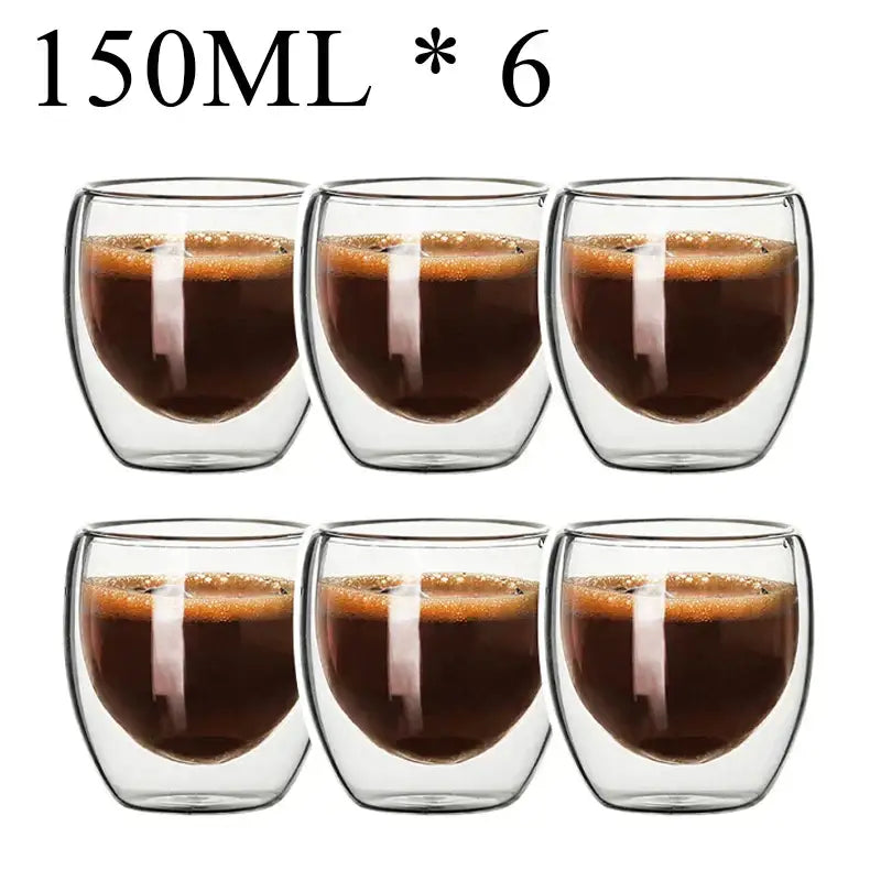 Six clear double wall borosilicate glass espresso cups each holding 150ml of dark espresso in a kitchen set