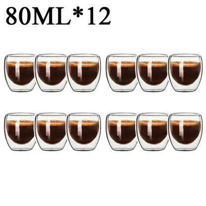 Twelve clear double wall borosilicate glass espresso cups each holding 80ml of dark coffee in modern kitchen set