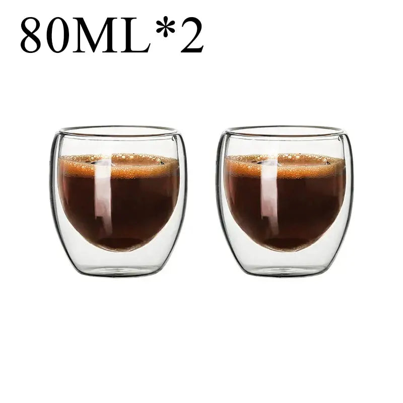 Modern clear double wall borosilicate glass espresso cups set with 80ml capacity filled with dark coffee