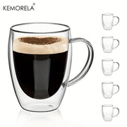 Modern clear double wall glass coffee mug filled with dark coffee topped with frothy milk and cocoa powder