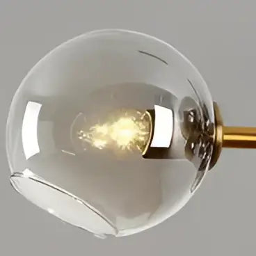 Modern clear and frosted glass ball pendant light with clear glass globe and brass-finished stem for dining room decorbites glass ball pendant