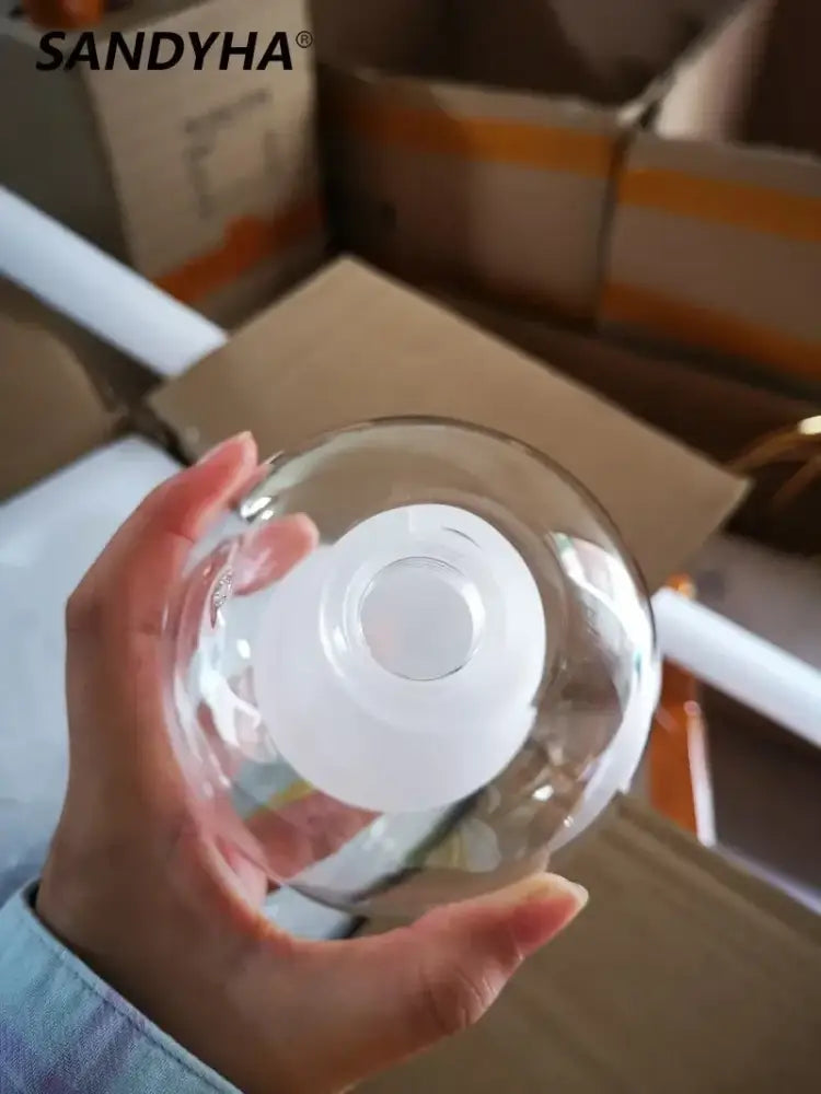 Modern clear and frosted glass ball pendant light with sandyha branding for dining room decorbites glass ball pendant