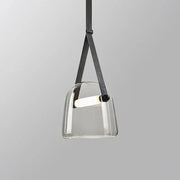 Modern clear glass pendant light fixture with black leather straps for kitchen lighting