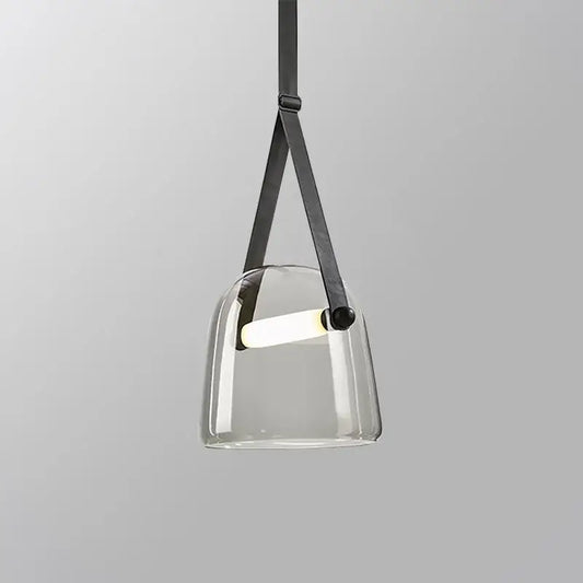 Modern clear glass pendant light fixture with black leather straps for kitchen lighting