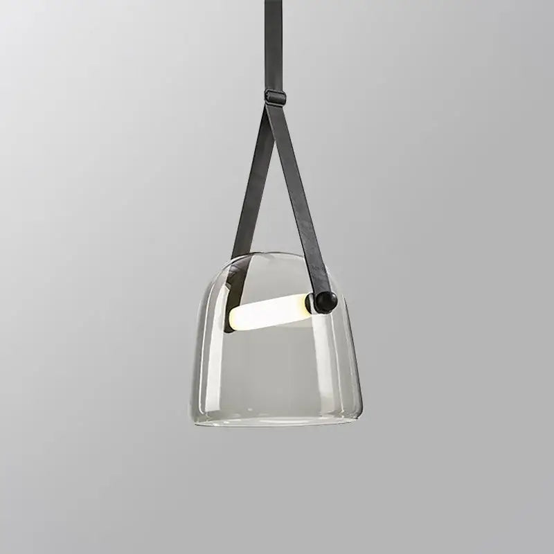 Modern clear glass pendant light fixture with black leather straps for kitchen lighting