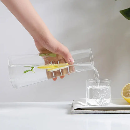 Modern clear glass bedside water carafe set with sleek decorbites clear glass pitcher featuring subtle side ridges