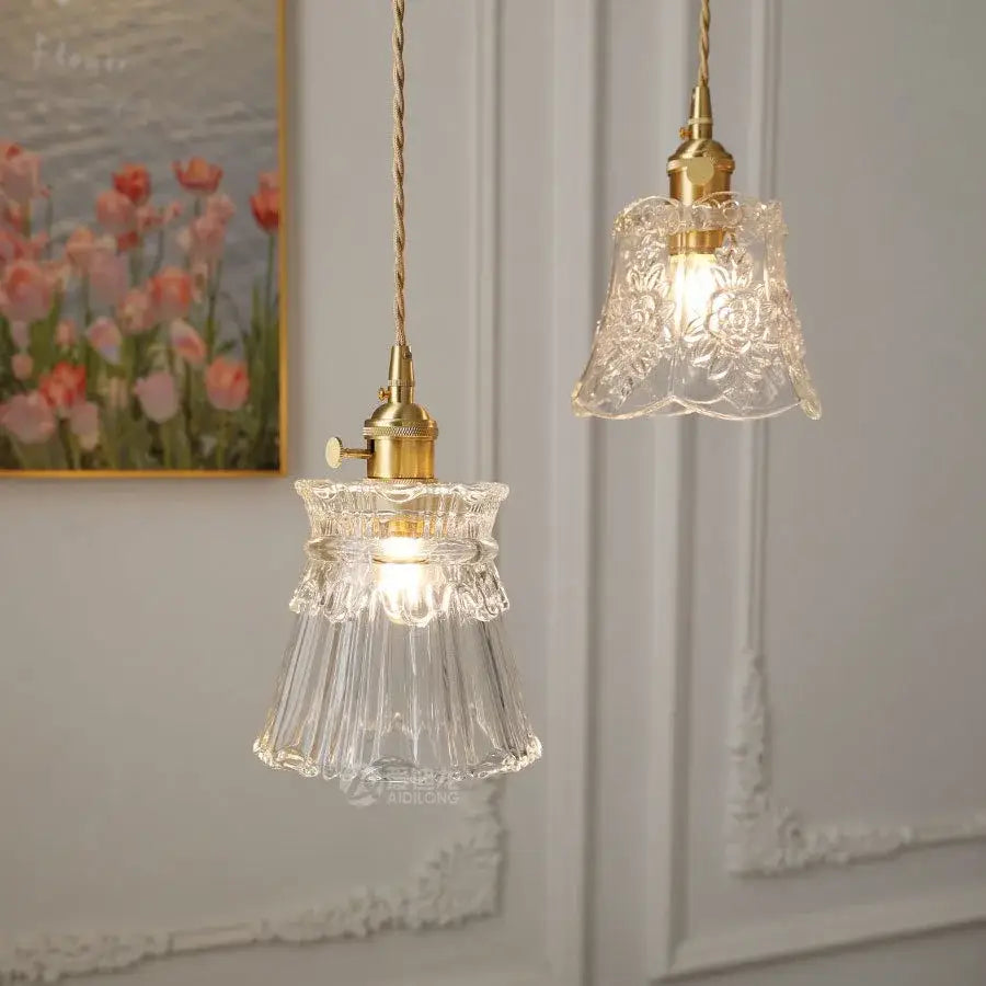 Modern clear glass copper pendant light featuring intricate floral etchings and gold-toned metal fixtures for decorbites pendant light decor