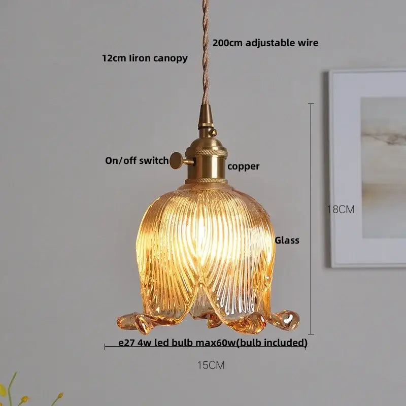 Modern clear glass copper pendant light with warm-toned ribbed glass and brass copper-finished metal fixture decorbites clear glass