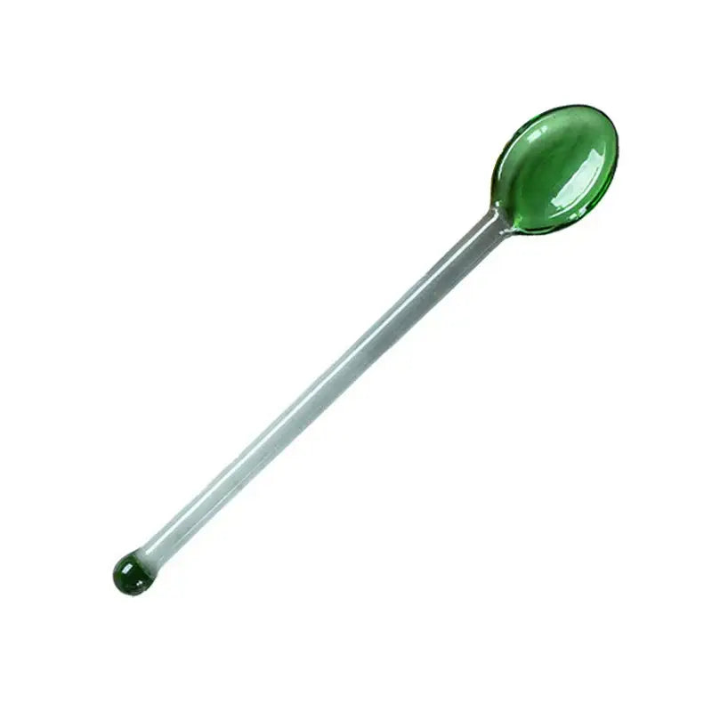 Translucent green glass spoon with spherical tip for modern clear glass dessert cup set and glass dessert use