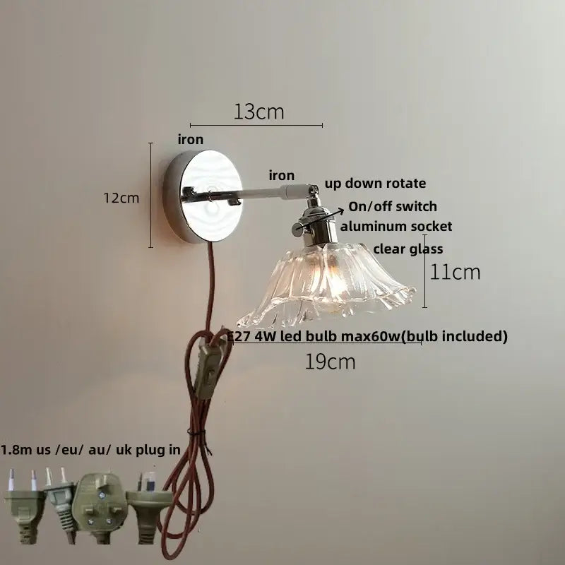 Modern clear glass led wall lamp with polished iron arm and base featuring clear glass shade for bedroom decorbites clear glass