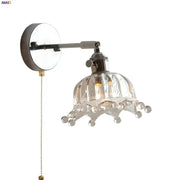 Modern clear glass led wall lamp with fluted crown-like lampshade and dangling crystal beads by decorbites clear glass