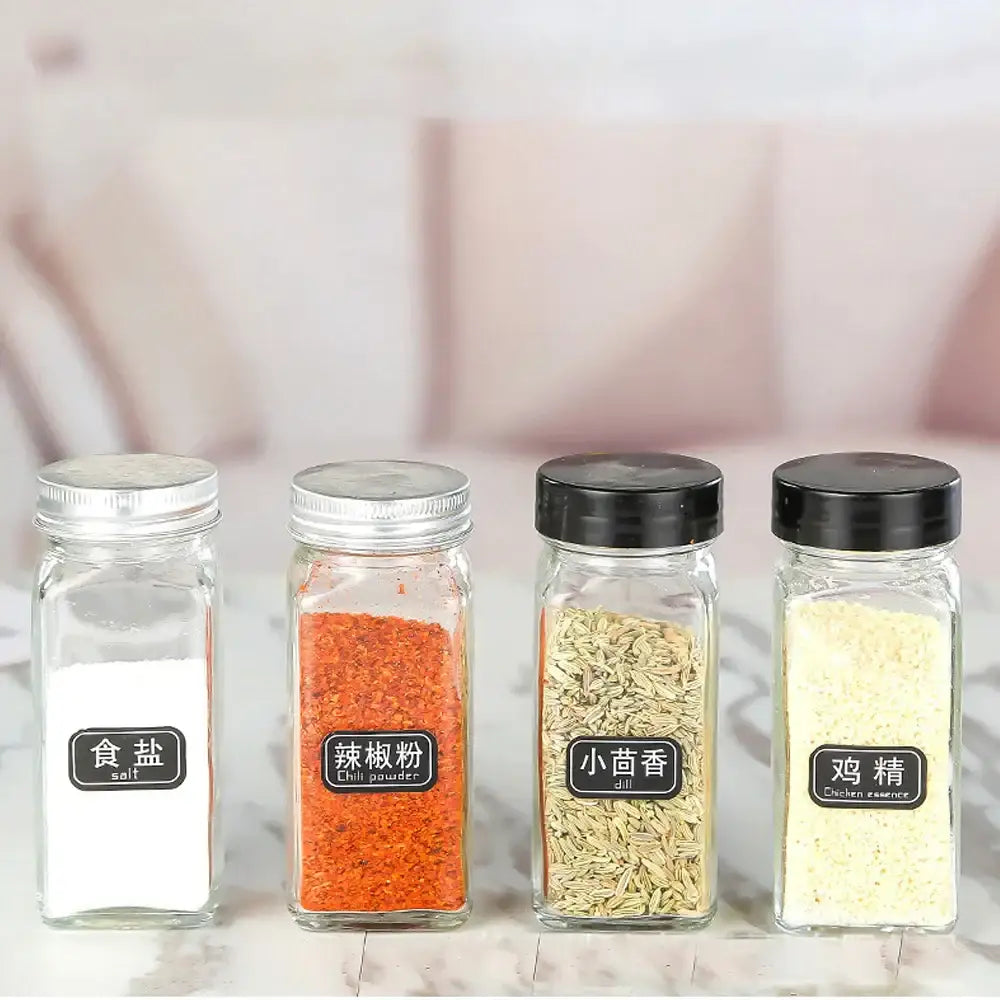 Modern clear glass seasoning jar set with black lids featuring salt chili powder dill and chicken essence labels in english and chinese
