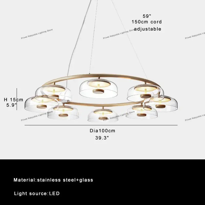 Modern clear glass table lamp with candle style design featuring brushed brass double-ring chandelier accents by decorbites clear glass