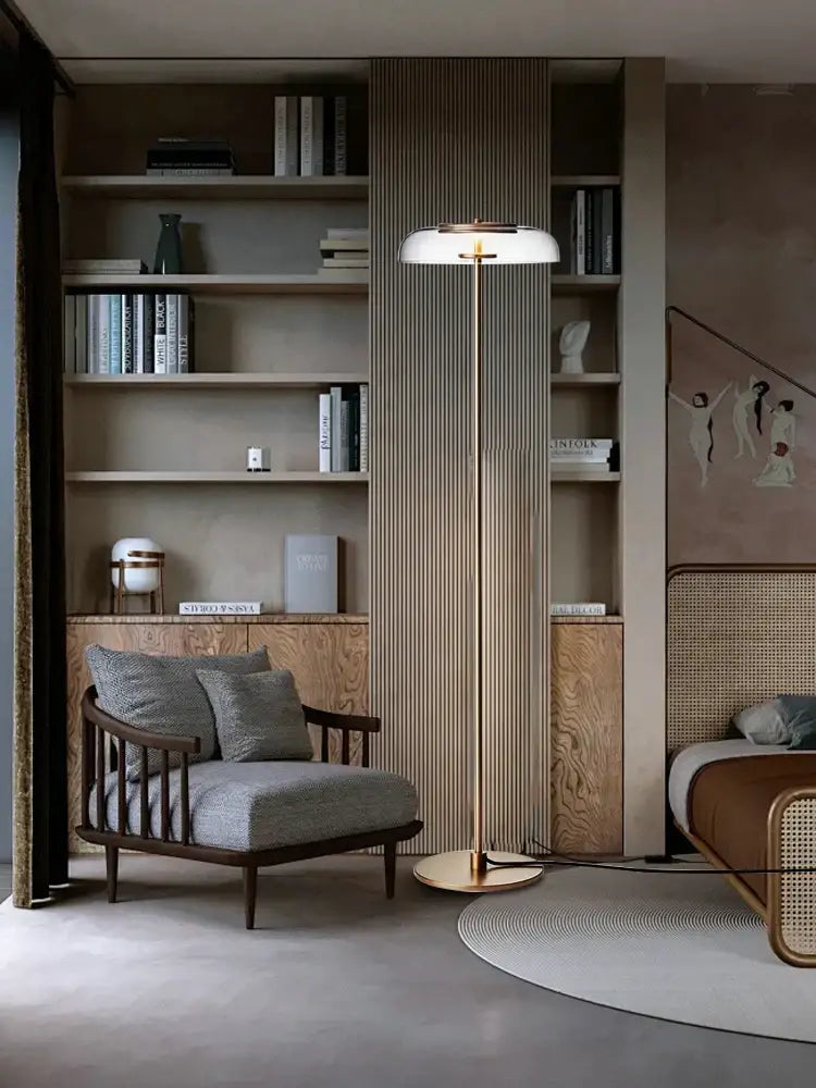 A sleek modern table lamp with a white translucent shade and gold-toned metal base by decorbites clear glass
