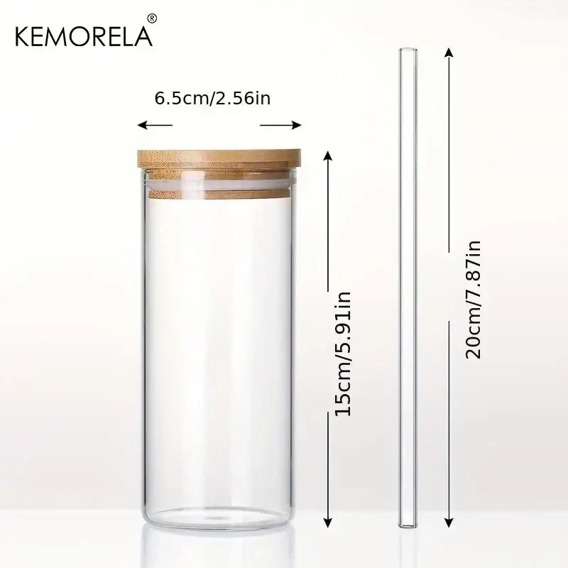 Clear glass tumbler cup with bamboo lid and straw branded kemorela in a modern 4-piece kitchen set