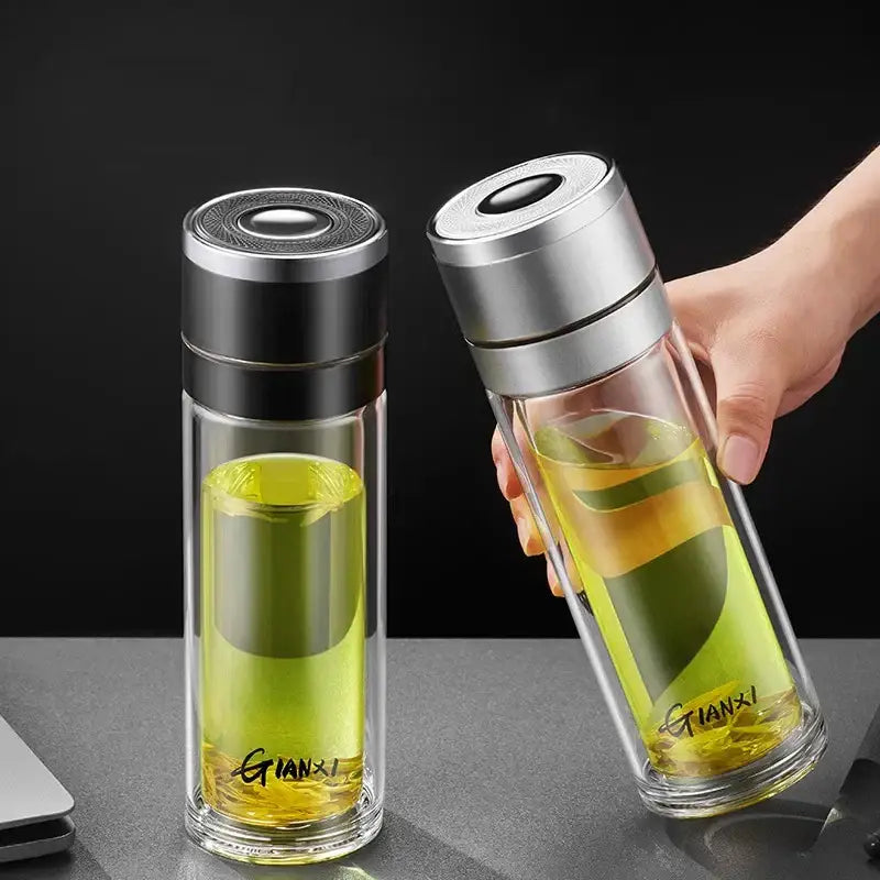 Modern clear insulated glass cup with black and silver lid featuring gianxi branding by decorbites insulated glass cup