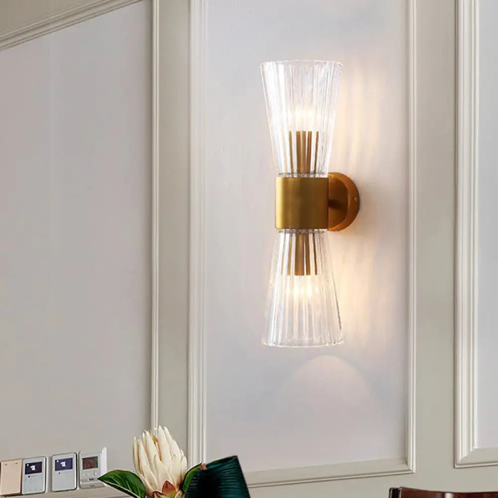 DecorBites™ DecorBites™ Modern Clear Prismatic Glass Wall Sconce with Hourglass Shape and Brass Finish – Up-Down Wall Lamp