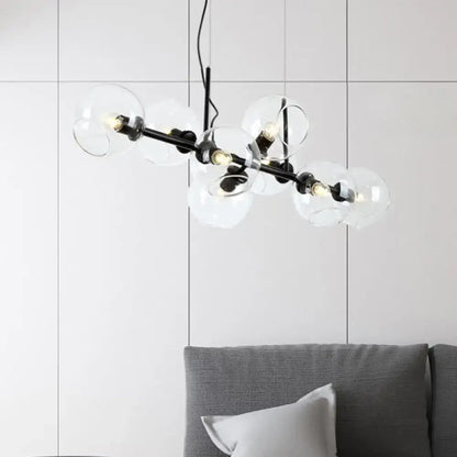 Modern black metal chandelier lighting fixture with clear smoke glass globe shades for dining room illumination