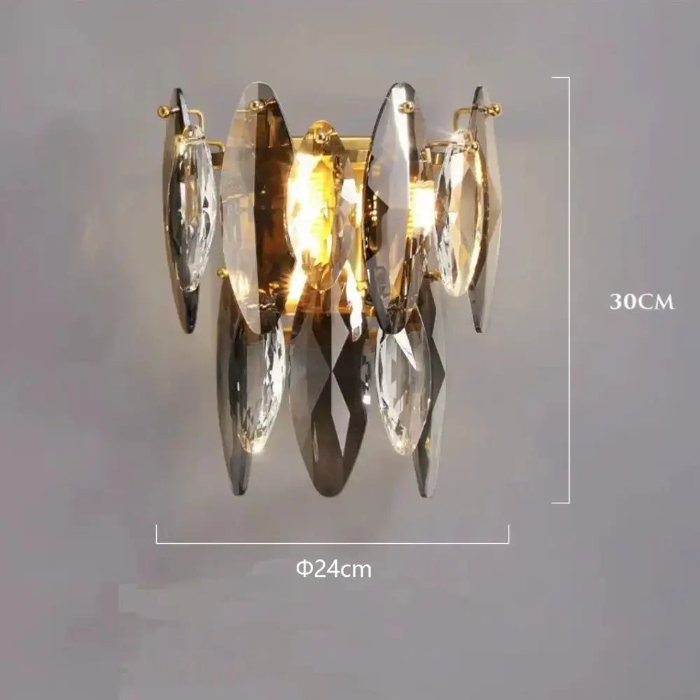 Gold-toned decorbites crystal led wall sconce with clear and smoky amber faceted crystals for modern living room decor