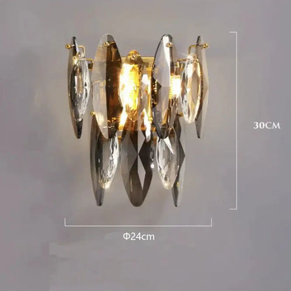 Gold-toned decorbites crystal led wall sconce with clear and smoky amber faceted crystals for modern living room decor