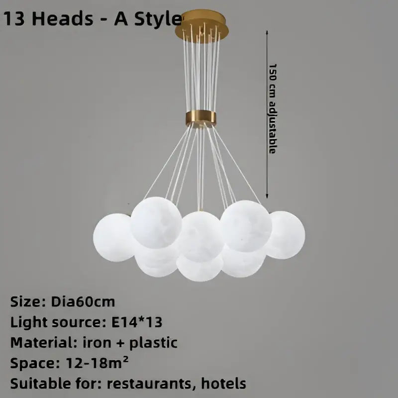 Modern white spherical ball pendant chandelier with gold-toned fixture and adjustable height for children room decorbites bubble ball