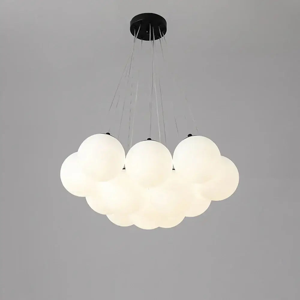 Modern cloud pendant light featuring frosted bubble glass ball spheres with a black ceiling mount for living room decorbites bubble glass