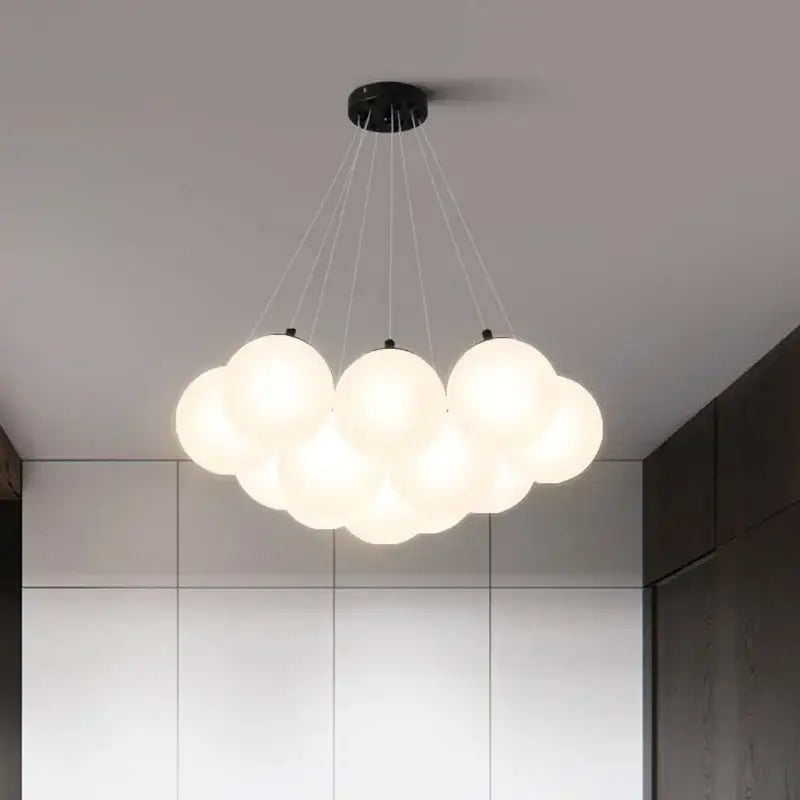 Modern cloud frosted glass ball led pendant light with black metal ceiling mount for living room decorbites glass ball decor