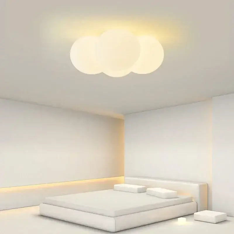 A modern three-lobed cloud glass ball milky white chandelier with a soft translucent finish for living room decorbites