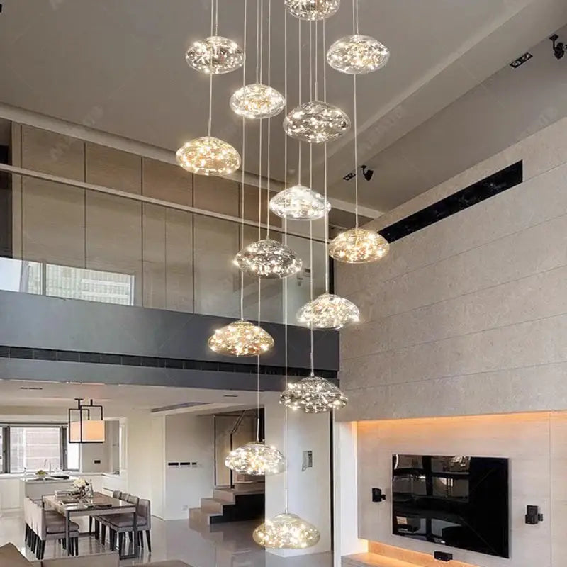 Modern cloud glass crystal pendant chandelier with multiple hanging crystal pendants as a warm dining room focal point