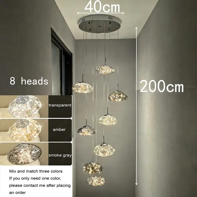 Modern cloud glass crystal pendant chandelier with eight illuminated cloud-shaped lights in amber and smoke gray finishes
