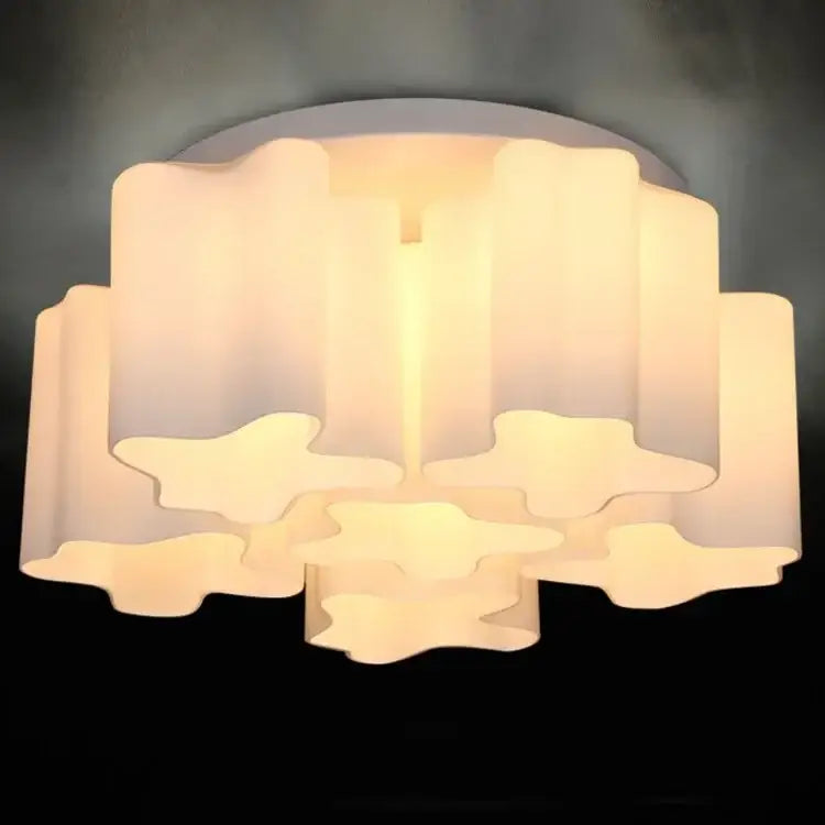 A modern cloud glass led ceiling light with layered frosted glass shades in white and black for bedroom decorbites