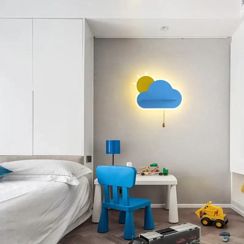 Modern cloud wall lamps featuring a blue cloud shape with a yellow sun detail and wooden pull chain for childrens bedroom decorbites cloud wall