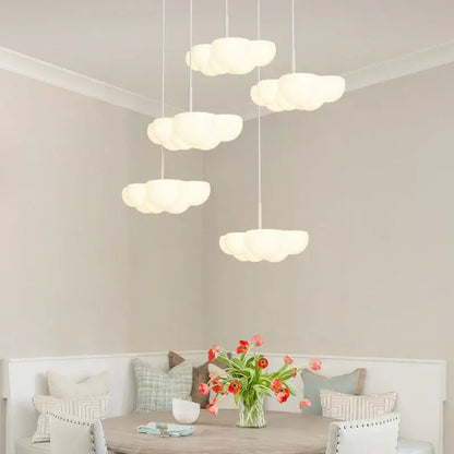 Modern cloud white floating pendant light with white cloud-shaped design hanging in dining room decorbites cloud white
