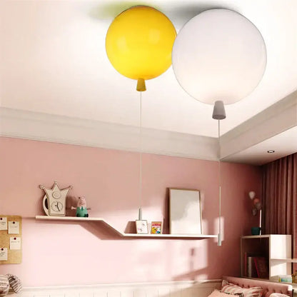 Two balloon acrylic ceiling lights in bright yellow and white with cords designed for kids bedroom ceiling light