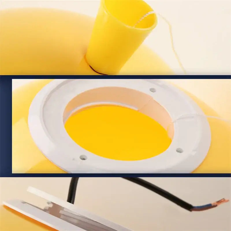 Yellow plastic inflatable pool float with white rim and black cable for modern balloon acrylic ceiling light